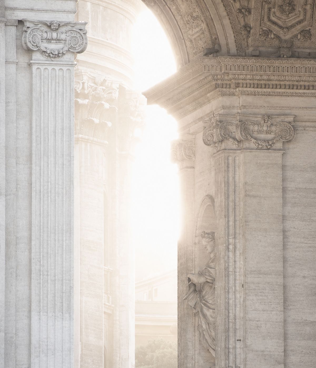 Light falling through a classical stone archway